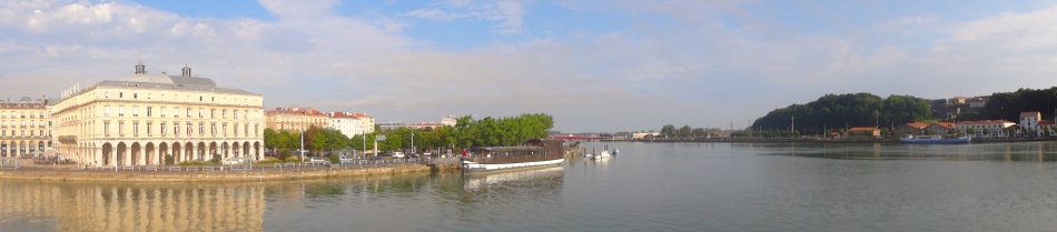 The river Adour in Bayonne with the town hall on the left